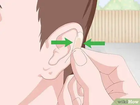 Image titled Cover an Ear Piercing for Swimming Step 4