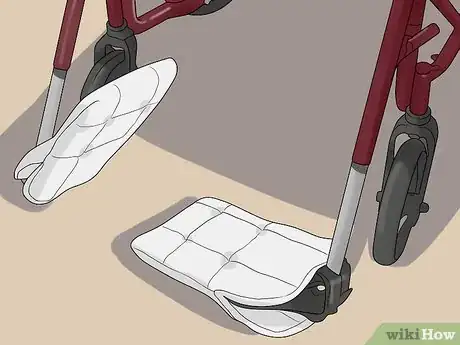 Image titled Fold a Wheelchair Step 3