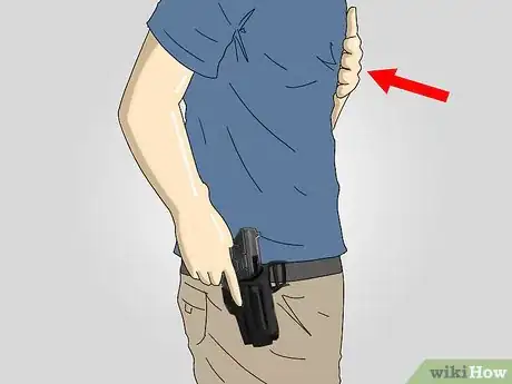 Image titled Do a Tactical Quickdraw With a Pistol Step 1