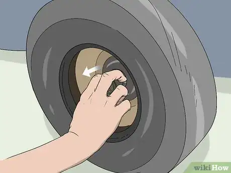 Image titled Remove a Lawn Mower Wheel Step 11