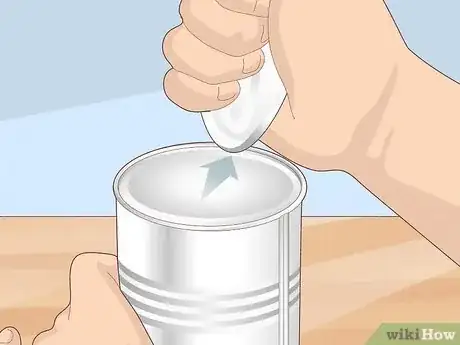 Image titled Open a Can Without a Can Opener Step 2