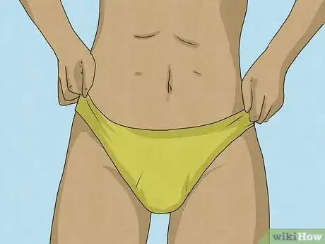 Image titled Tuck for Swimming Step 7