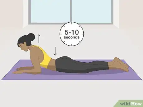 Image titled Stretch for Sciatica Step 1